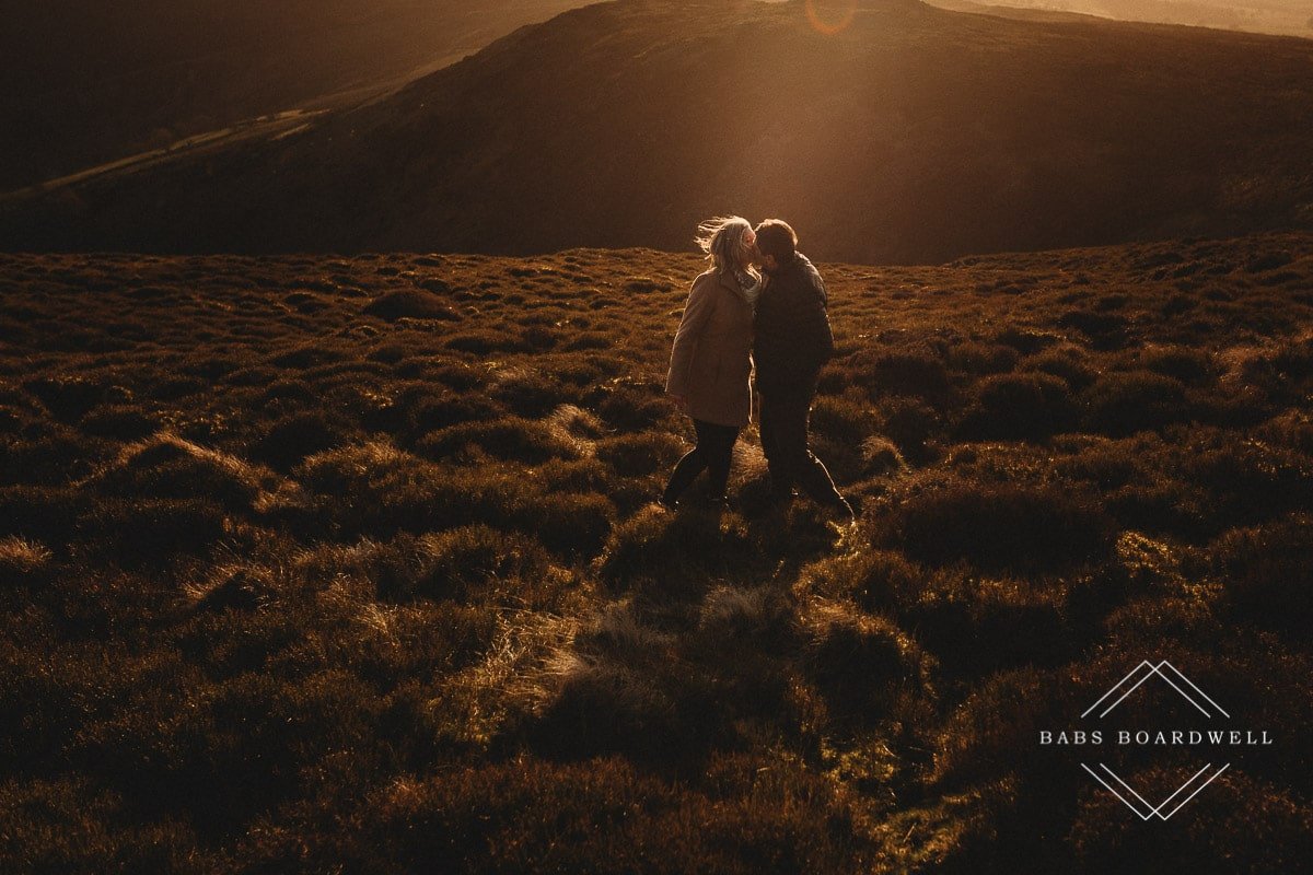 couple kissing at sunset in North Wales by Denbigh Wedding Photographer