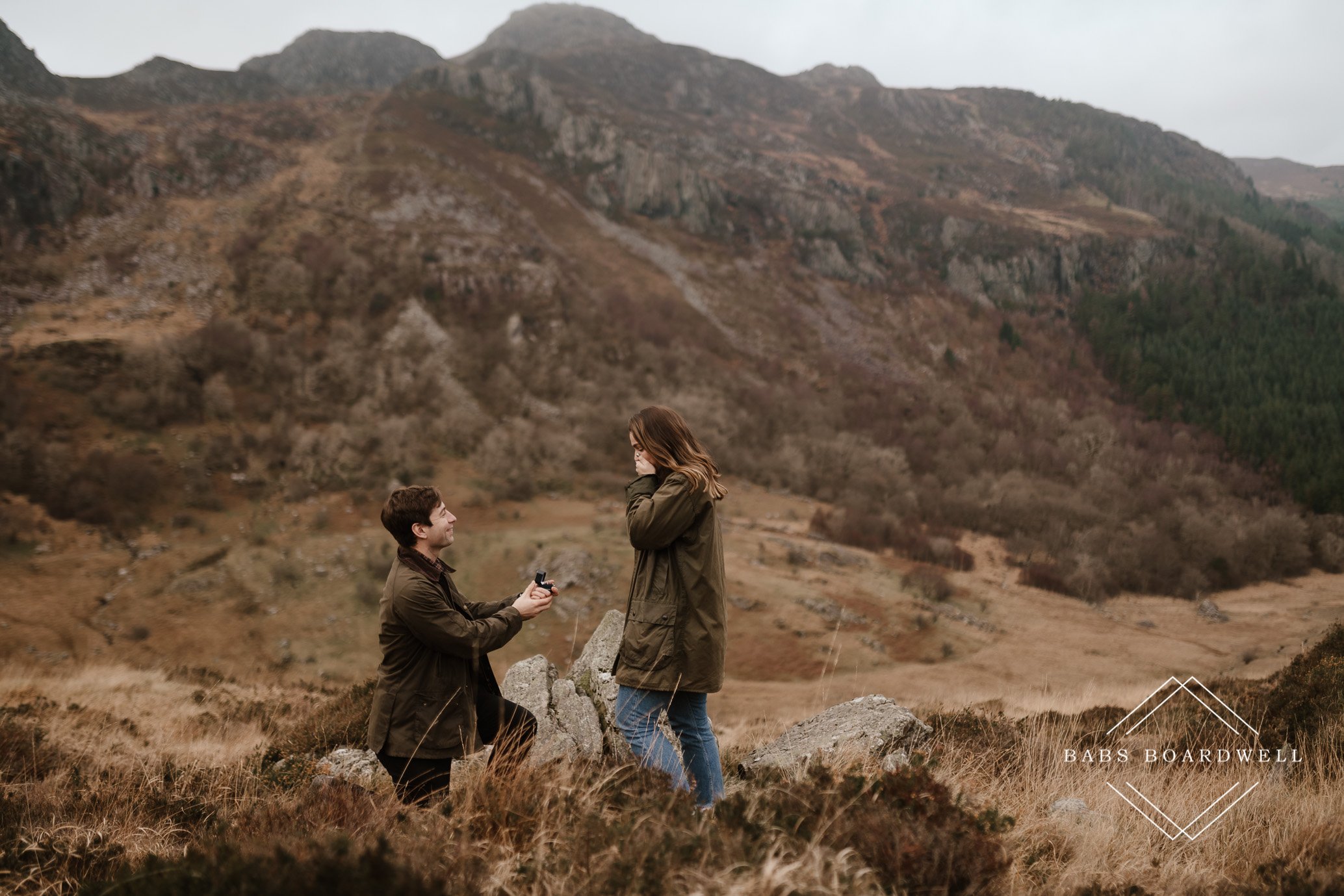 Romantic surprise proposal photography in the mountains