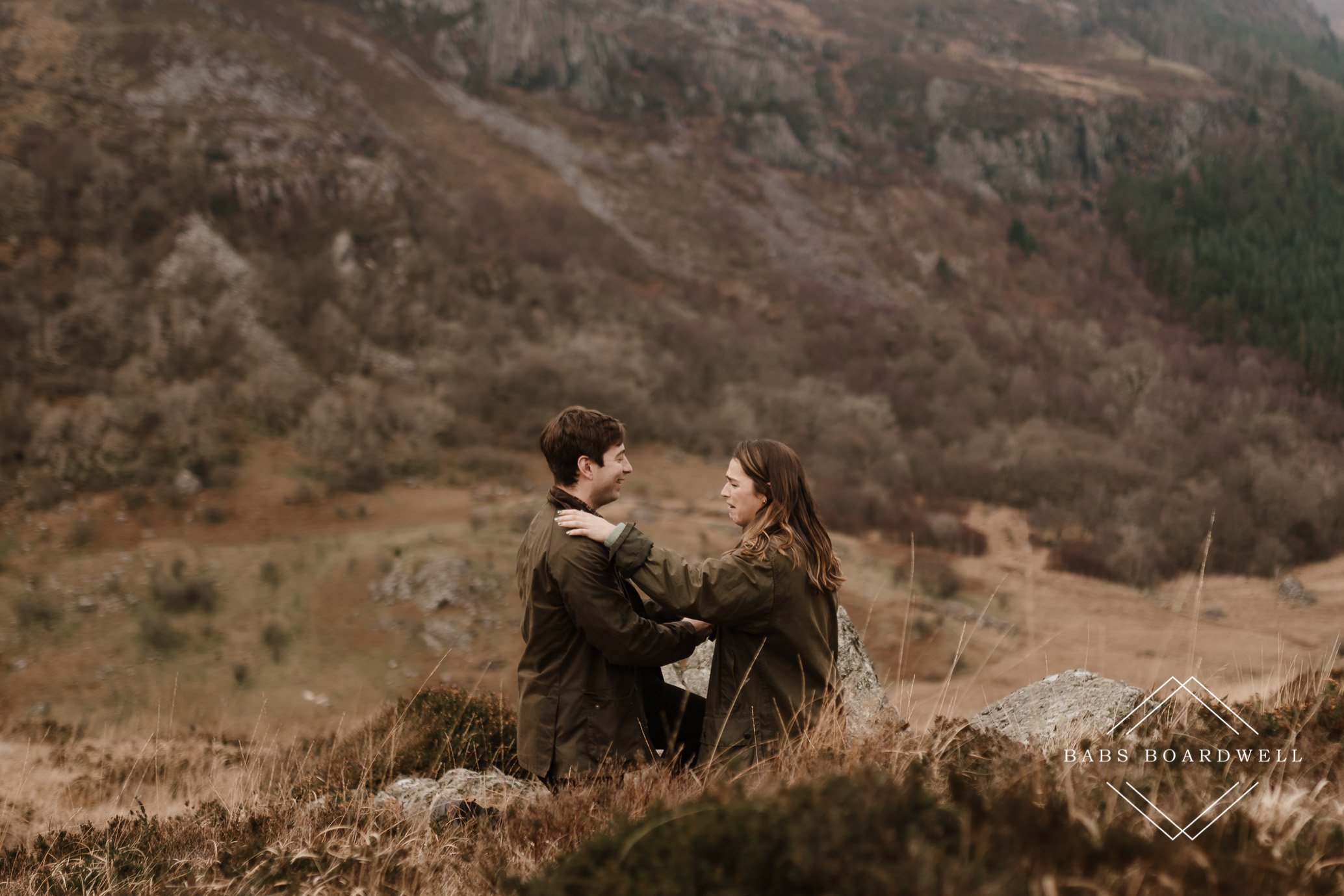Romantic surprise proposal in the mountains