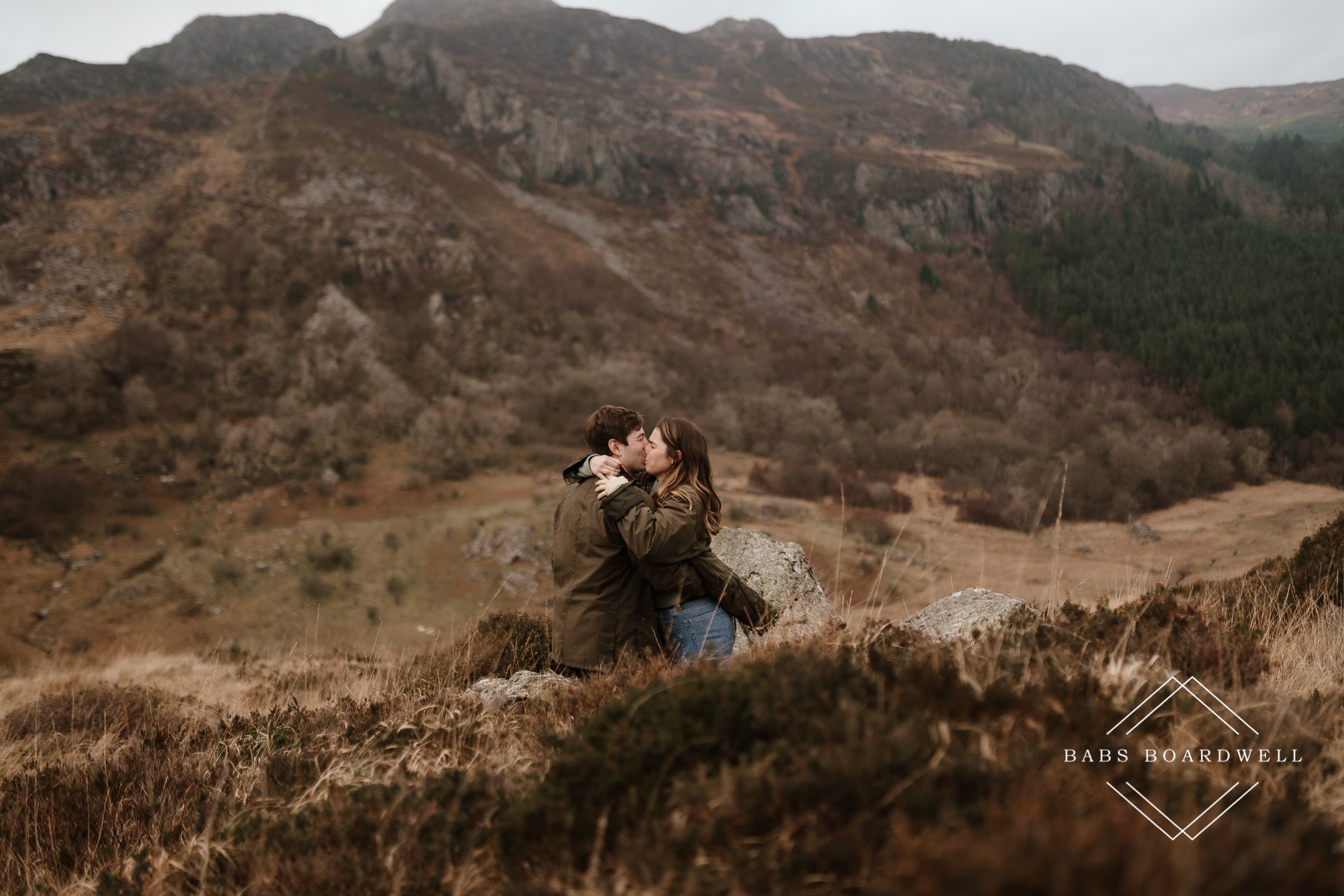 romantic surprise proposal in the mountains
