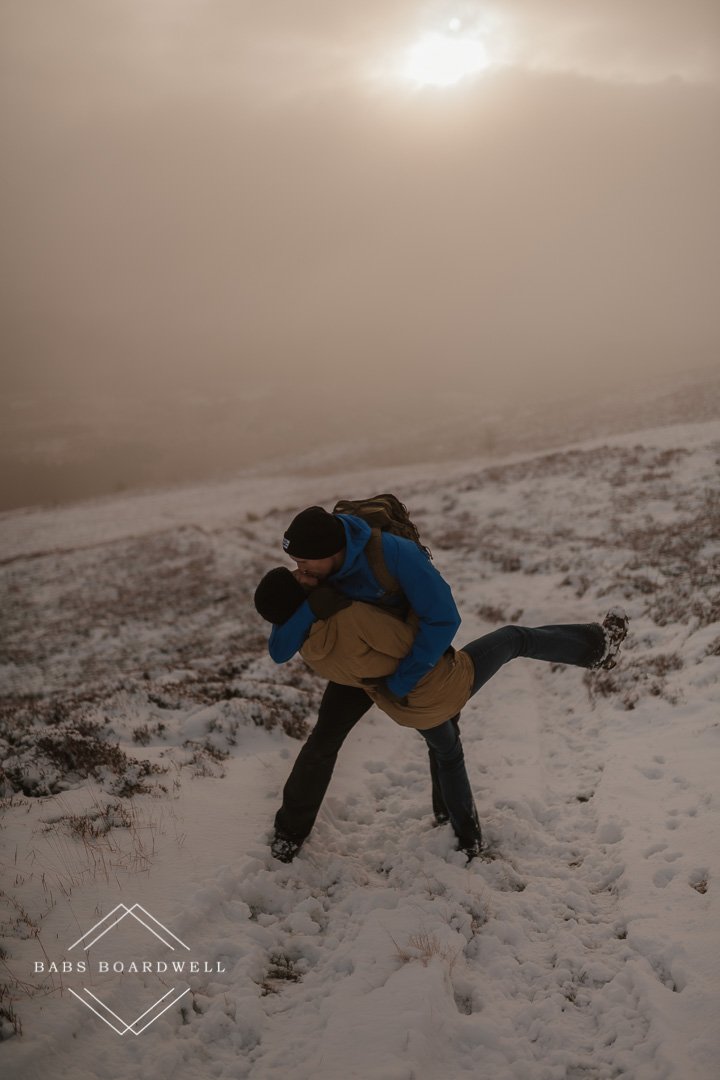 fun couple session in the snow