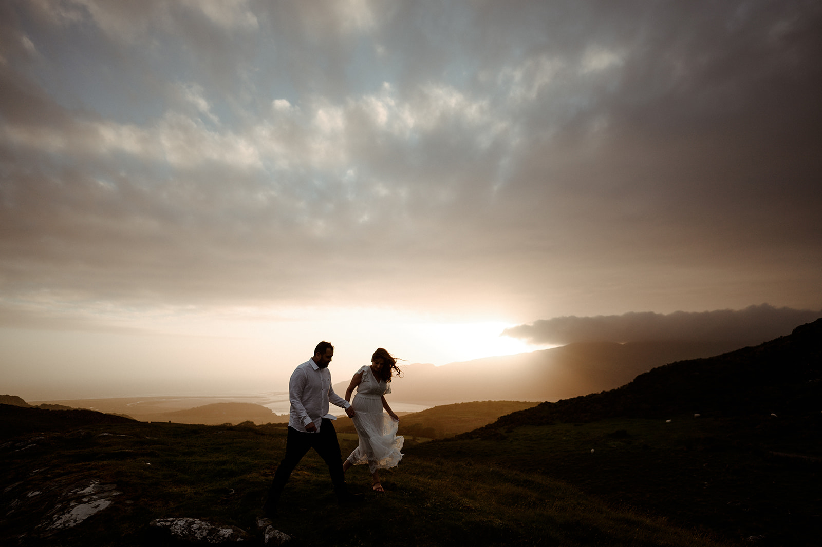 adventure couple photography at sunset in Snowdonia | Pre-wedding photography UK