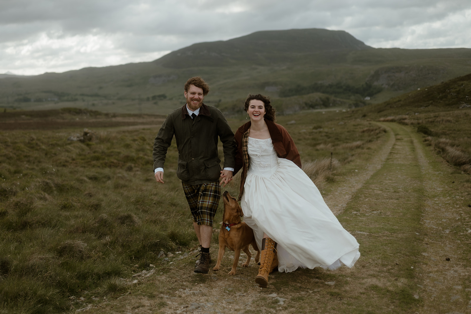Couple eloping with their dog in Snowdonia National Park