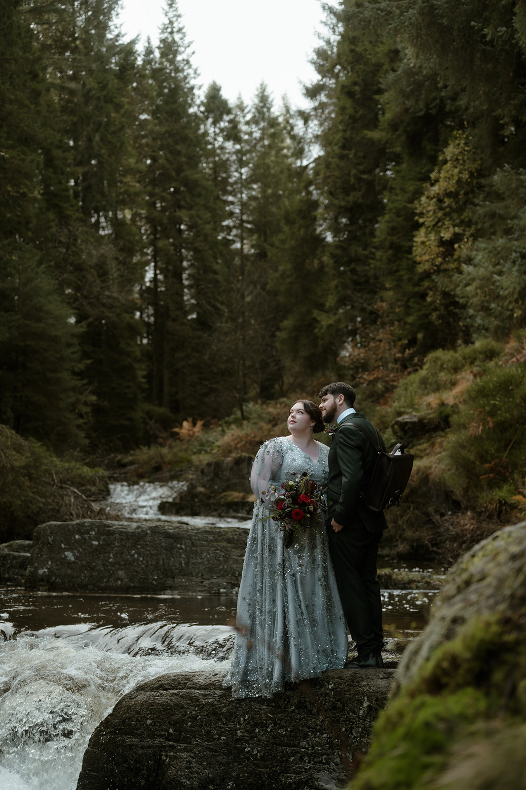 Eco-friendly elopement in Snowdonia, Wales - couple celebrating a simple, sustainable wedding day in the forest.